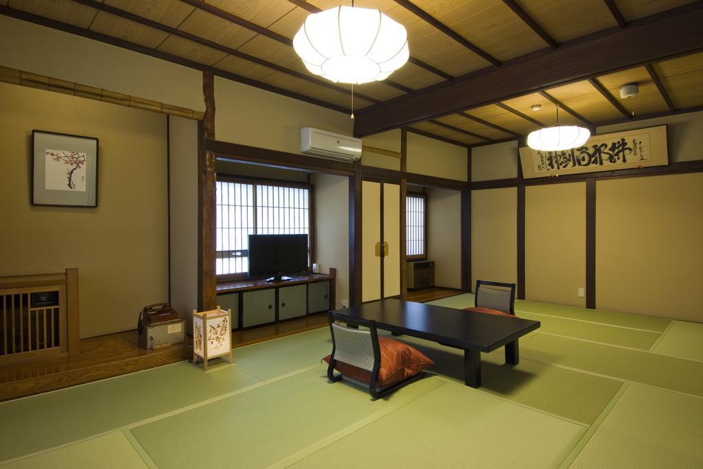 Ekinariya Ryokan Kuszacu Szoba fotó
