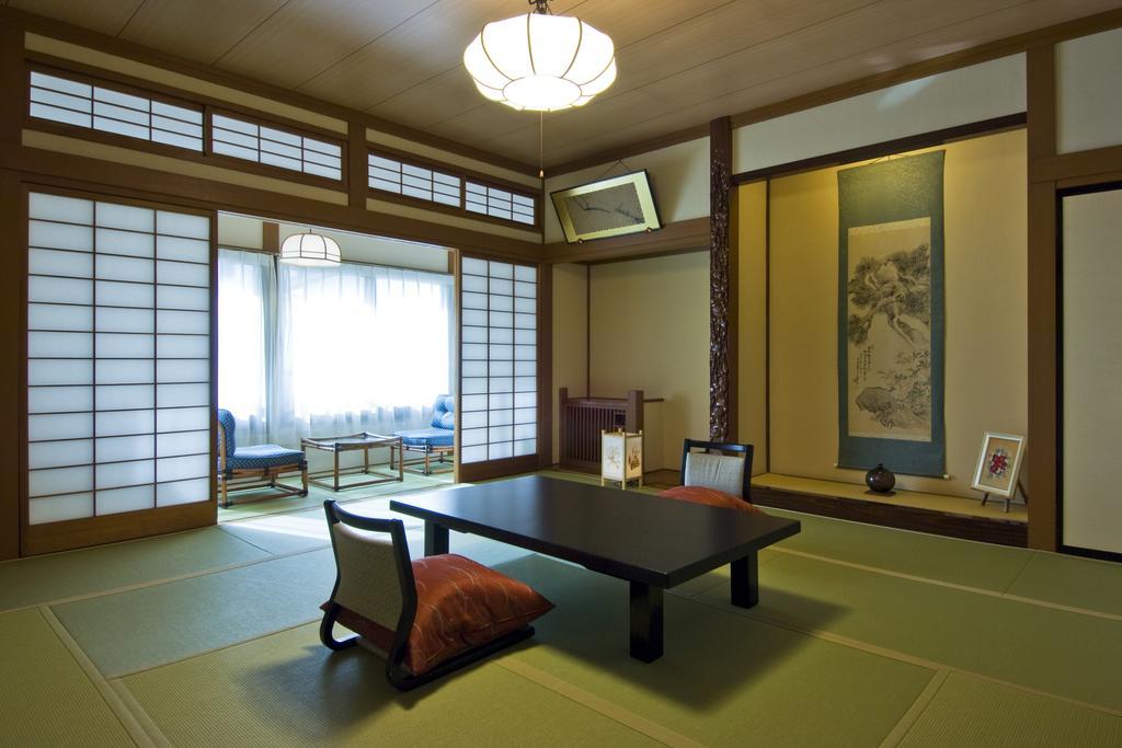 Ekinariya Ryokan Kuszacu Szoba fotó